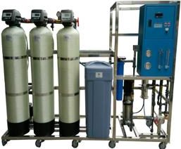 Packaged multi-vessel water filtration skid with control panel